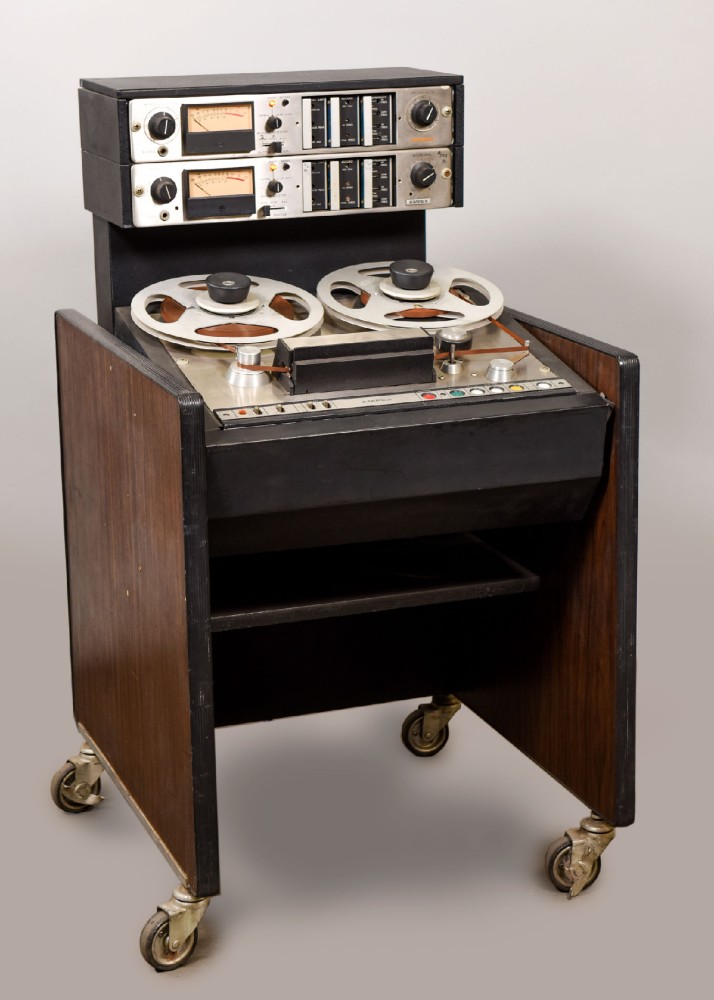 Reel-To-Reel Tape Recorder, AMPEX AG440B, Stereo Tape Recorder For Studio Or Radio, Adjustible Deck Angle, Has Matching Partner, Comes With Hubs, Reels, And Tape, Non-Operational, Woodgrain, AMPEX, 1960s+, 43"H, 24"W, 28"L