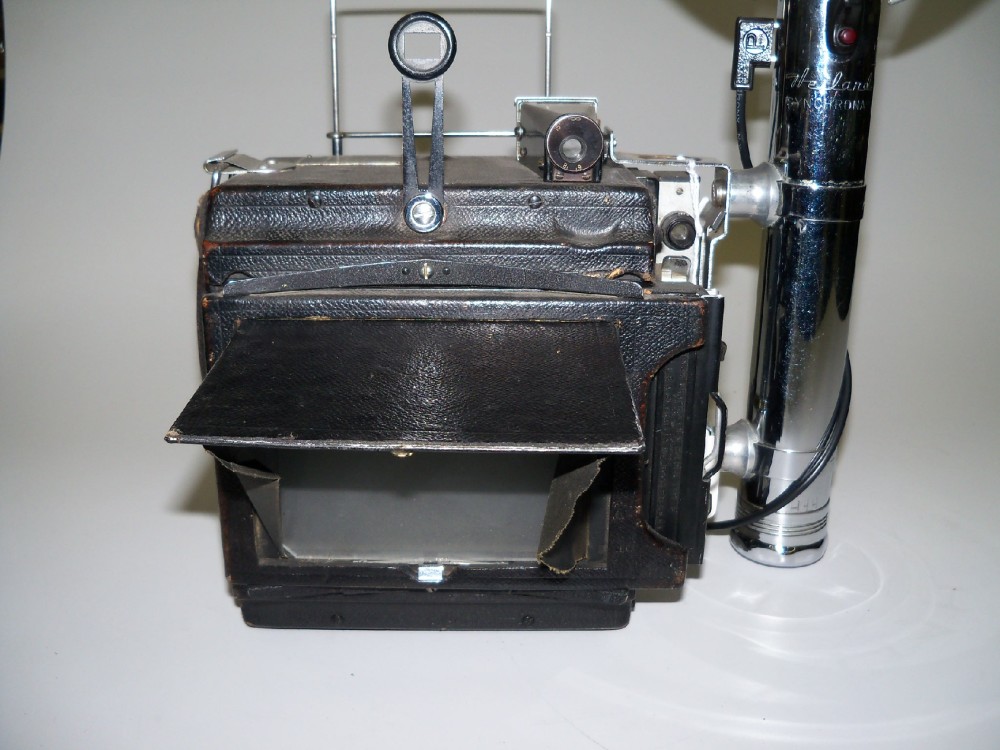 Camera, Graflex Speed Graphic, With Lens, Side-Mounted Hand Strap, And Film Magazine, Black, 1940s+, Wood