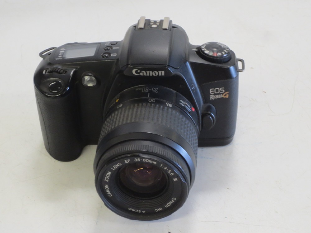 Camera, 35mm, Amateur, Canon EOS Rebel G, Ser.No.1274136, With 80mm Lens And Strap, Black, Canon