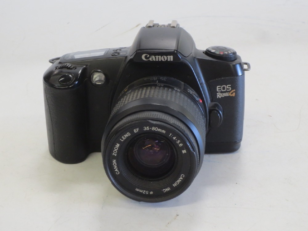 Camera, 35mm, Amateur, Canon EOS Rebel G, Ser.No.1274136, With 80mm Lens And Strap, Black, Canon