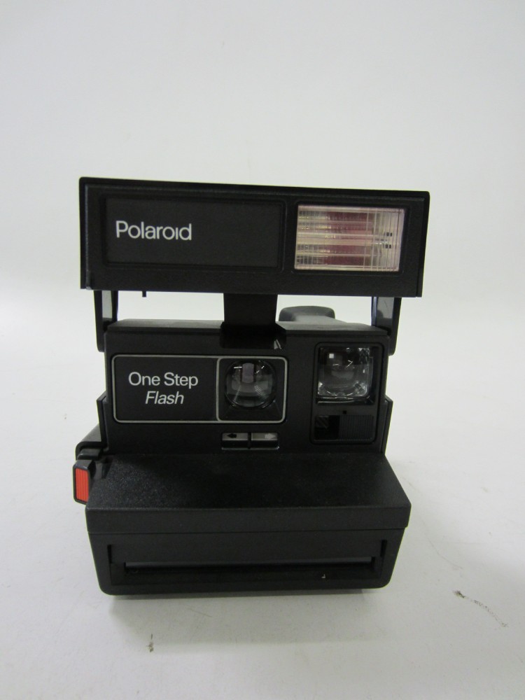 Polaroid 600 One Step Flash, Black Plastic With Nylon Strap, PRACTICAL.  Uses Polaroid i-type film or 600 film.  Introduced: 1992, Black, Polaroid, 1990s+, Plastic, 5.75", 5.25", 3.75"
