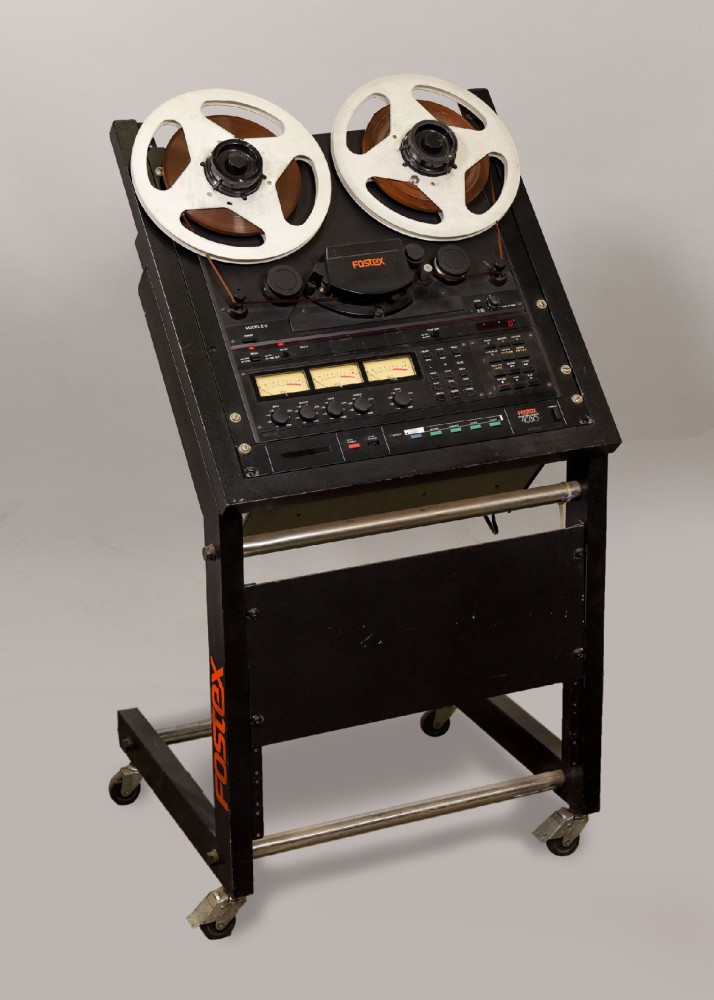 Reel-To-Reel Tape Recorder, Fostex Model 4030 3 Track Tape Recorder For Recording Or Radio, Mounted In Rolling Open Rack, Angled Back With Rack Space Below, 3 VU Meters, Comes With Hubs, Reels, And Tape, Black, Fostex, 1980s+, 43"H, 22"W, 21"L