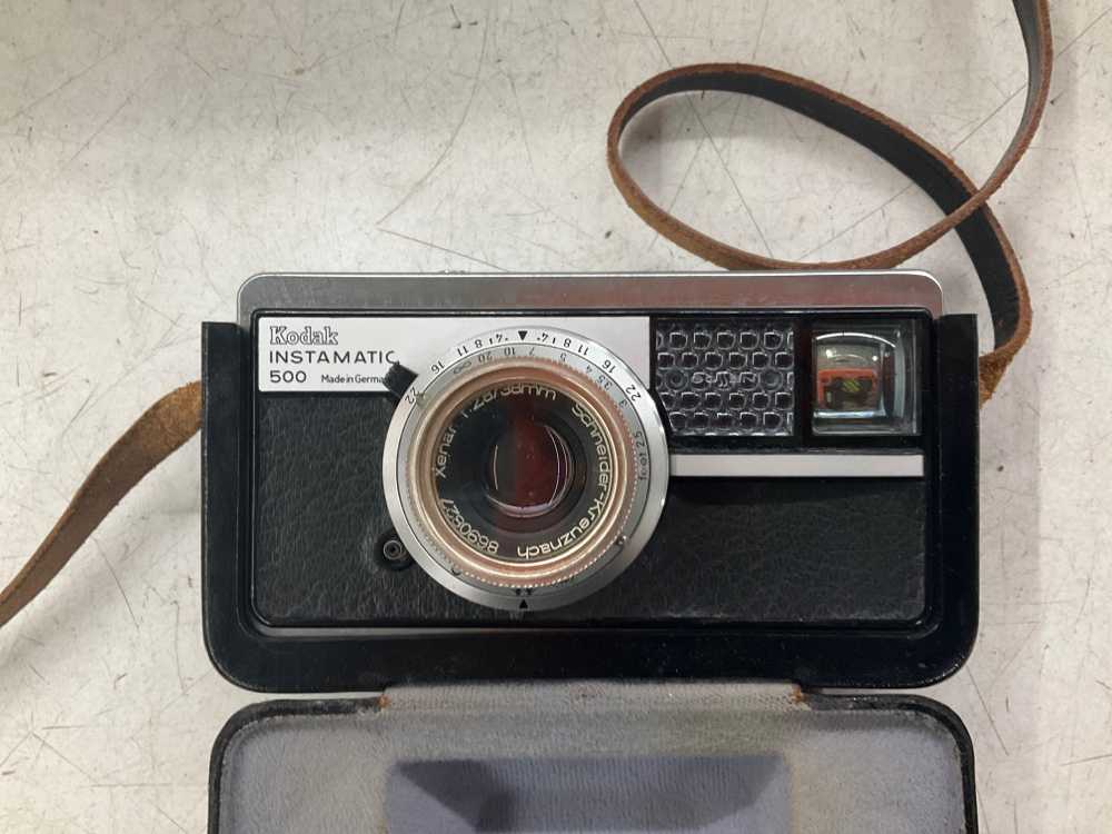 Kodak Instamatic 500, Has Attached Leather Casing, Black, Kodak, Metal, 2.5" H, 8.25"W, 5.5" L