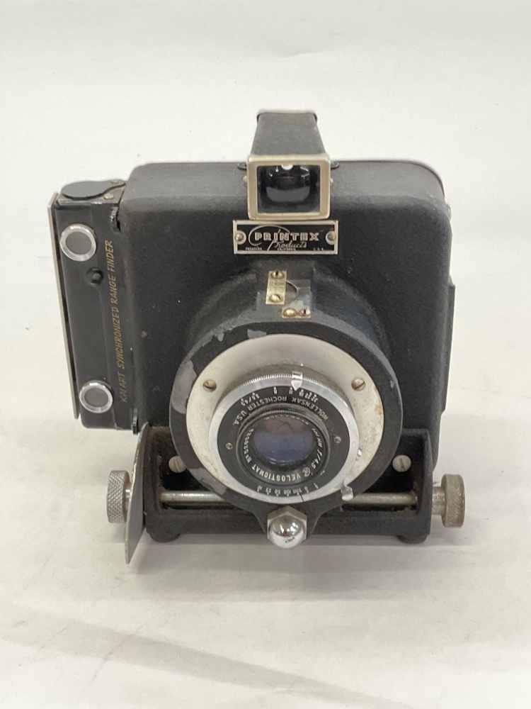 Camera, Printex Press Camera, Mini-Press Version (Film size 2¼" × 3¼")  Serial Number AB7765., Black, Printex, 1940s+, Metal, 6", 6", 5"