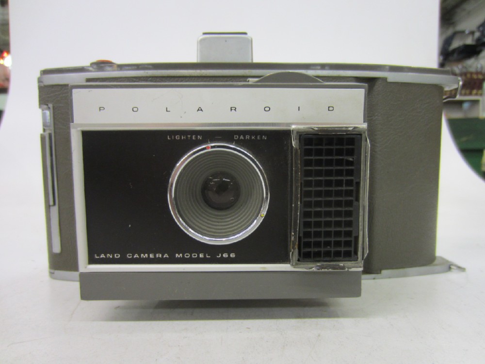 Polaroid Land Camera "Automatic 230".  Uses replacement film: Fujifilm FP100c (Color) and FP3000b (B&W)  Introduced: 1967, Gray, Polaroid, 1960s+, Metal, USA
