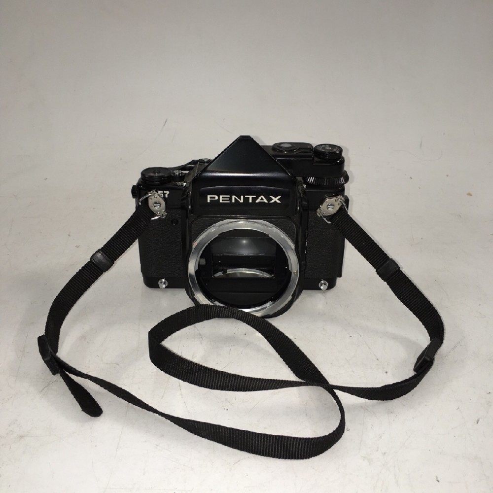 Pentax model 67, Ser.No.633992.  With Pentax-branded neck strap attached.  Introduced in 1990., Black, Pentax, 1990+, Metal, Japan