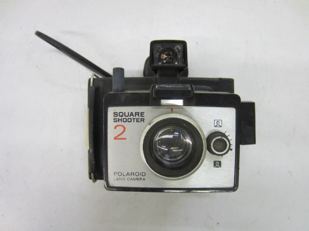 Polaroid Land Camera, Model Square Shooter 2, also known as "OneStep 2". Uses Polaroid 600 and (i-type) film.  Introduced: 1972., Black, Polaroid, 1970s+, Plastic, USA