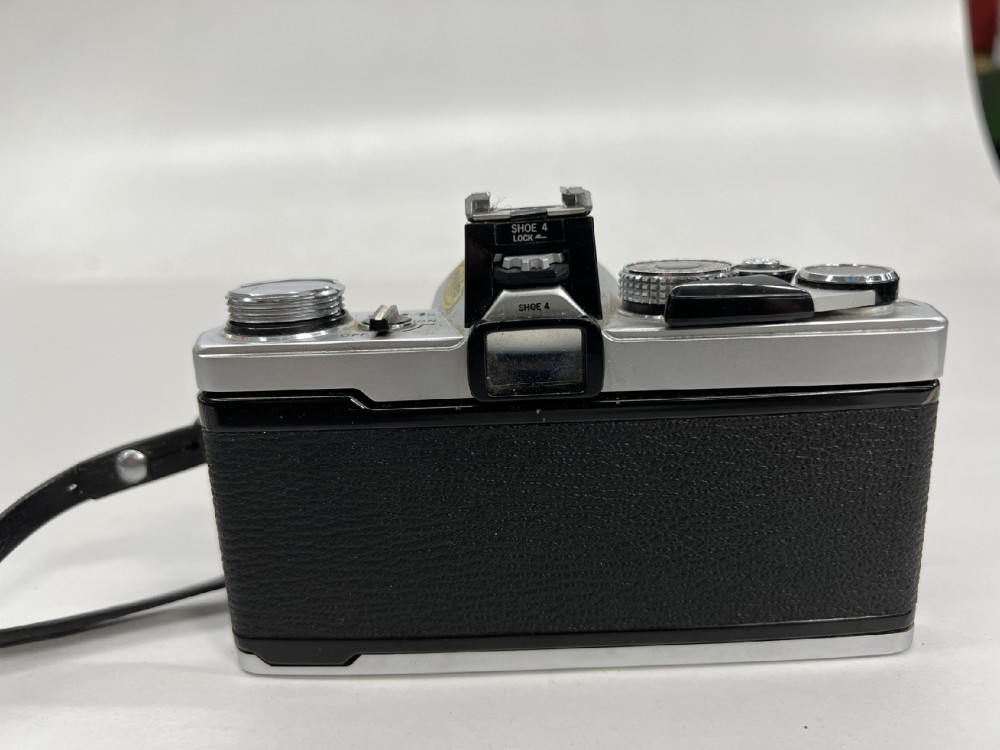Camera Body, 35mm, Olympus Model OM-1N, With Olympus-Branded Neck Strap, Serial Number 1827445, Black, 1970s+, Metal
