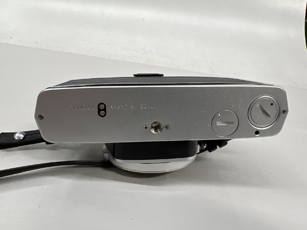 Camera Body, 35mm, Olympus Model OM-1N, With Olympus-Branded Neck Strap, Serial Number 1827445, Black, 1970s+, Metal