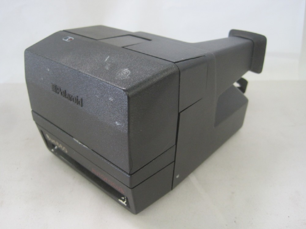 Polaroid Model Sun 660, With Neck Strap, Uses Polaroid 600 Series Film, Which Is Readily Available As Of 04/23/2019.  Introduced: 1981, Black, Polaroid, 1980s+, Plastic