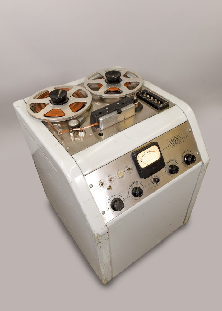 Reel-To-Reel Tape Recorder, Ampex, Mono 1/4" Machine, Rigged With A Radio And A Xenyx 502 Mixer Inside Console - Meter "Dances" To Either Radio Input Or Microphone Input Via The Mixer, Lights Up On Panel And Meter, Practical, Gray, Ampex