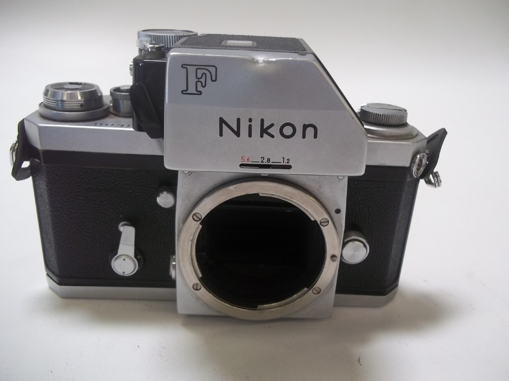 Nikon F Photomic FTN #6775040. Camera Pictured Not Actual Camera. Camera Missing Film Wind Up Handle, Circa 1968-1974, Black, Nikon, 1960+, Plastic, Japan, 6"w, 3"d, 5"h
