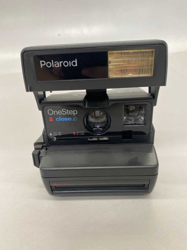 Polaroid One Step Close Up.  Uses Polaroid 600 film. Introduced 1993., Black, Polaroid, 1990s+, Plastic