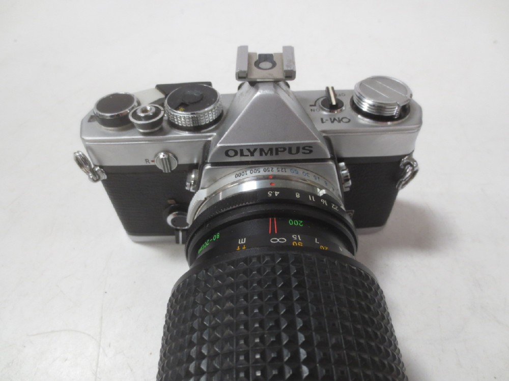 Model OM-1, S/N 665397. With Makinon Lens. , Silver, Olympus, Metal