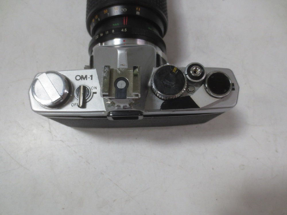 Model OM-1, S/N 665397. With Makinon Lens. , Silver, Olympus, Metal