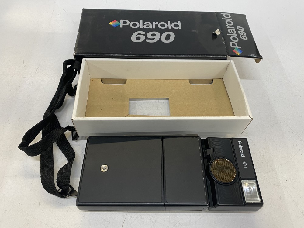 Still Camera, Polaroid 690, In Box.  Uses Polaroid 600 film.  Introduced:  1996, Black, Polaroid, 1990s+, Plastic, USA
