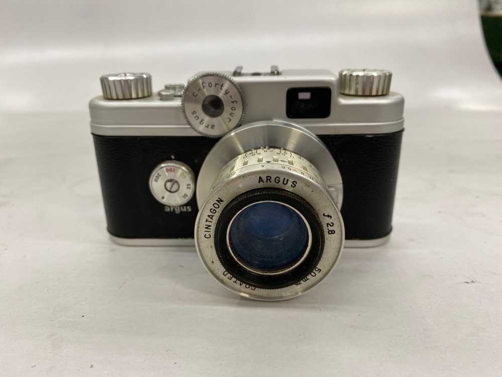 Camera, Argus C Fourty Four, Uses 35mm Film.  Has leather case (33260963) (Package 5595)  Manufactured 1956-1957, Silver, Argus, 1950s+, Metal