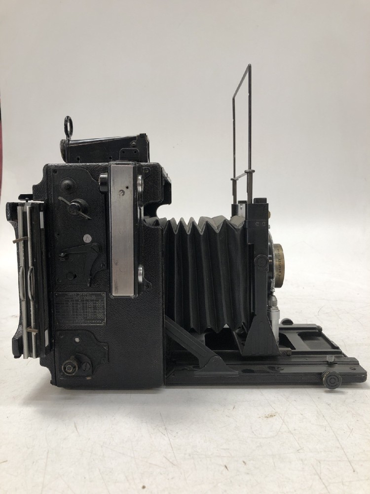 Camera, Graflex Speed Graphic, No Serial Number, With Graphex Optar Lens Serial Number 295065, With Film Magazine And Side Handle, Black, 1940s+, Wood, USA