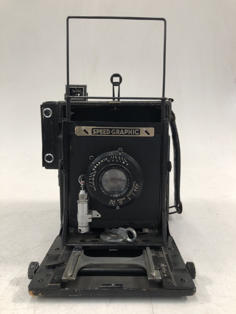 Camera, Graflex Speed Graphic, No Serial Number, With Kodak Supermatic 127mm Lens Serial Number EA1465, With Film Magazine And Side Handle, Black, 1940s+, Wood, USA