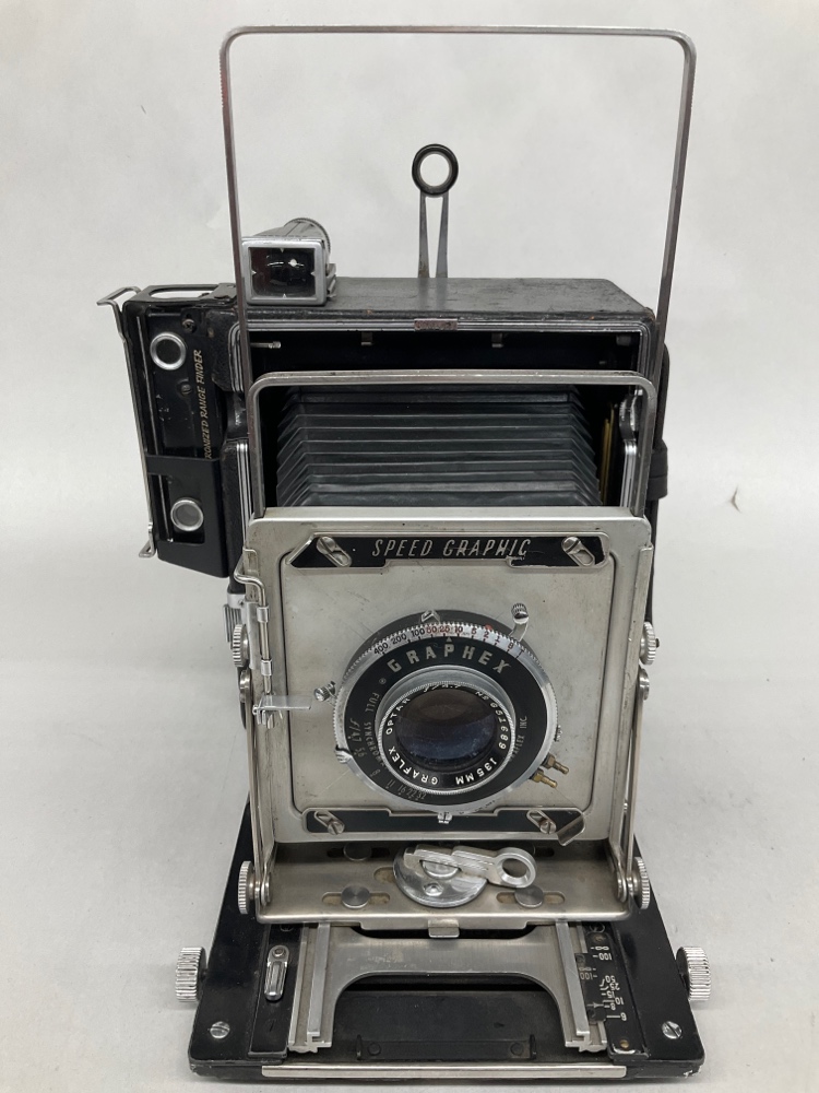 Camera, Graflex Speed Graphic, With Side Handle And Film Magazine, Lens Is A Graflex Optar 135mm Lens Serial Number G51689, Black, Speed Graphic, 1950s+, Wood, USA