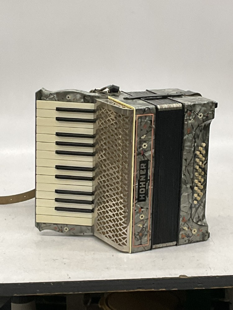 Accordian, Hohner Brand, 24 Keys, Comes with Black Leather Straps, Rents in Case #33264294, Silver, Metal